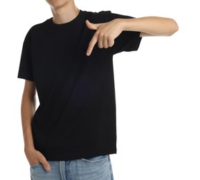 Teenage boy wearing black t-shirt on white background, closeup