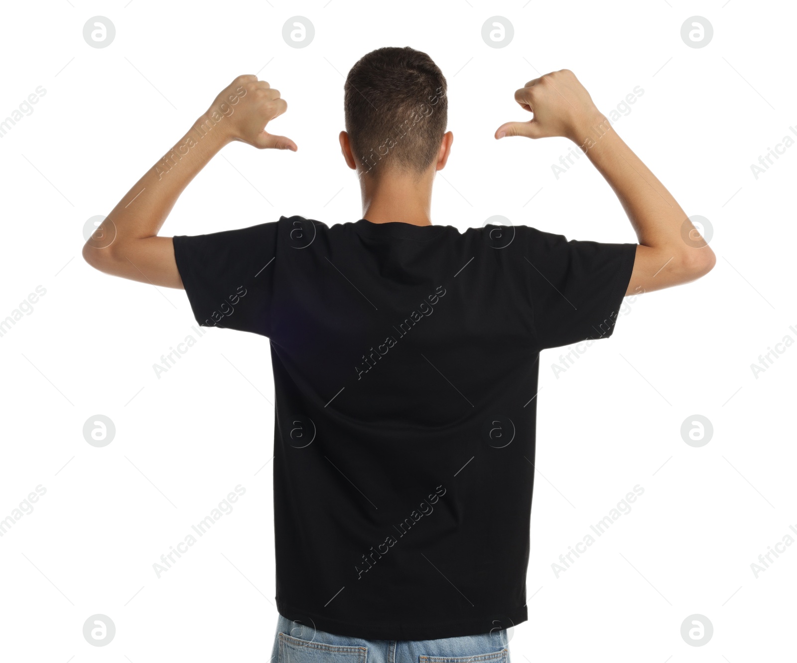 Photo of Teenage boy wearing black t-shirt on white background, back view