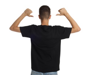 Photo of Teenage boy wearing black t-shirt on white background, back view