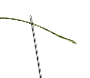 Photo of Sewing needle with green thread isolated on white