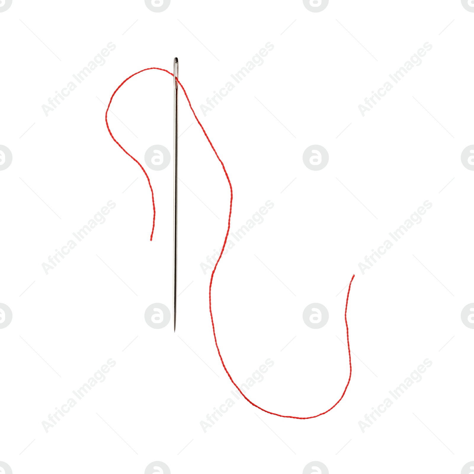 Photo of Sewing needle with red thread isolated on white