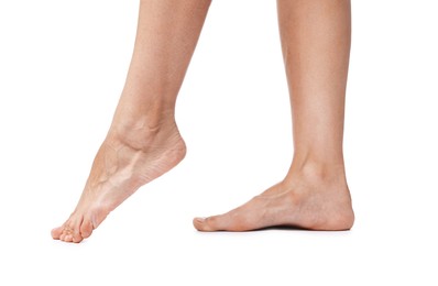 Photo of Woman with smooth feet on white background, closeup