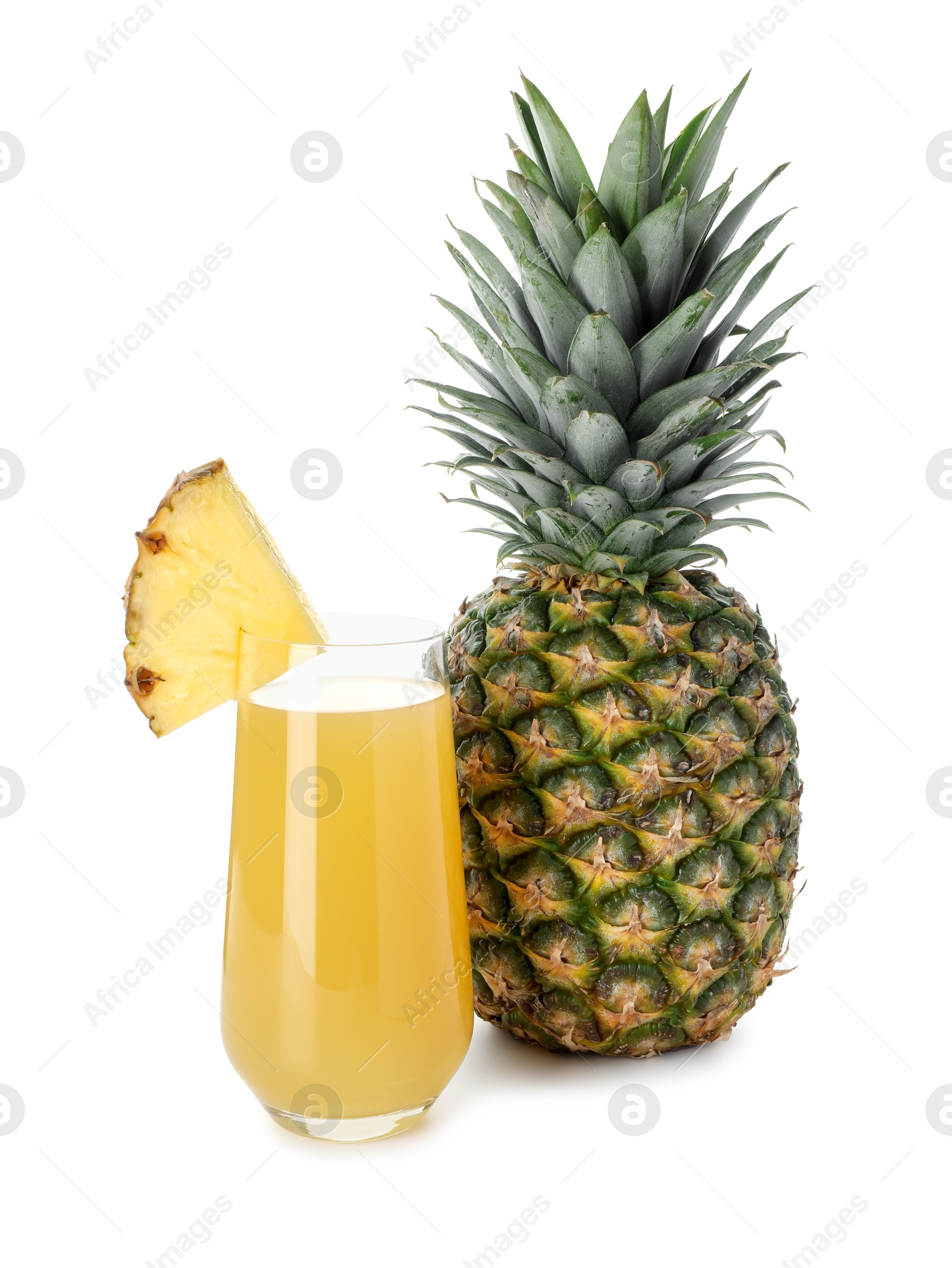 Photo of Glass with pineapple juice and fresh pineapples isolated on white