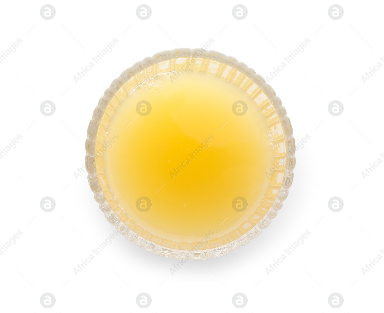 Photo of Glass with tasty pineapple juice isolated on white, top view