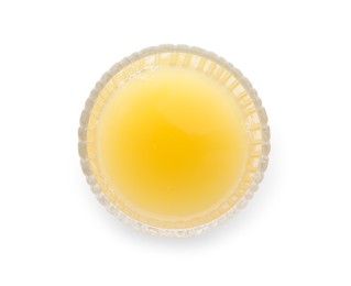 Photo of Glass with tasty pineapple juice isolated on white, top view