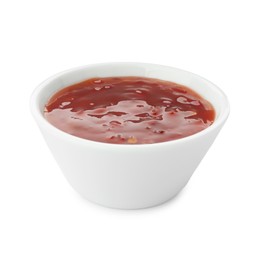 Photo of Hot chili sauce in bowl isolated on white