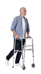 Senior man using walking frame on white background