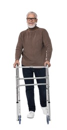 Senior man using walking frame on white background