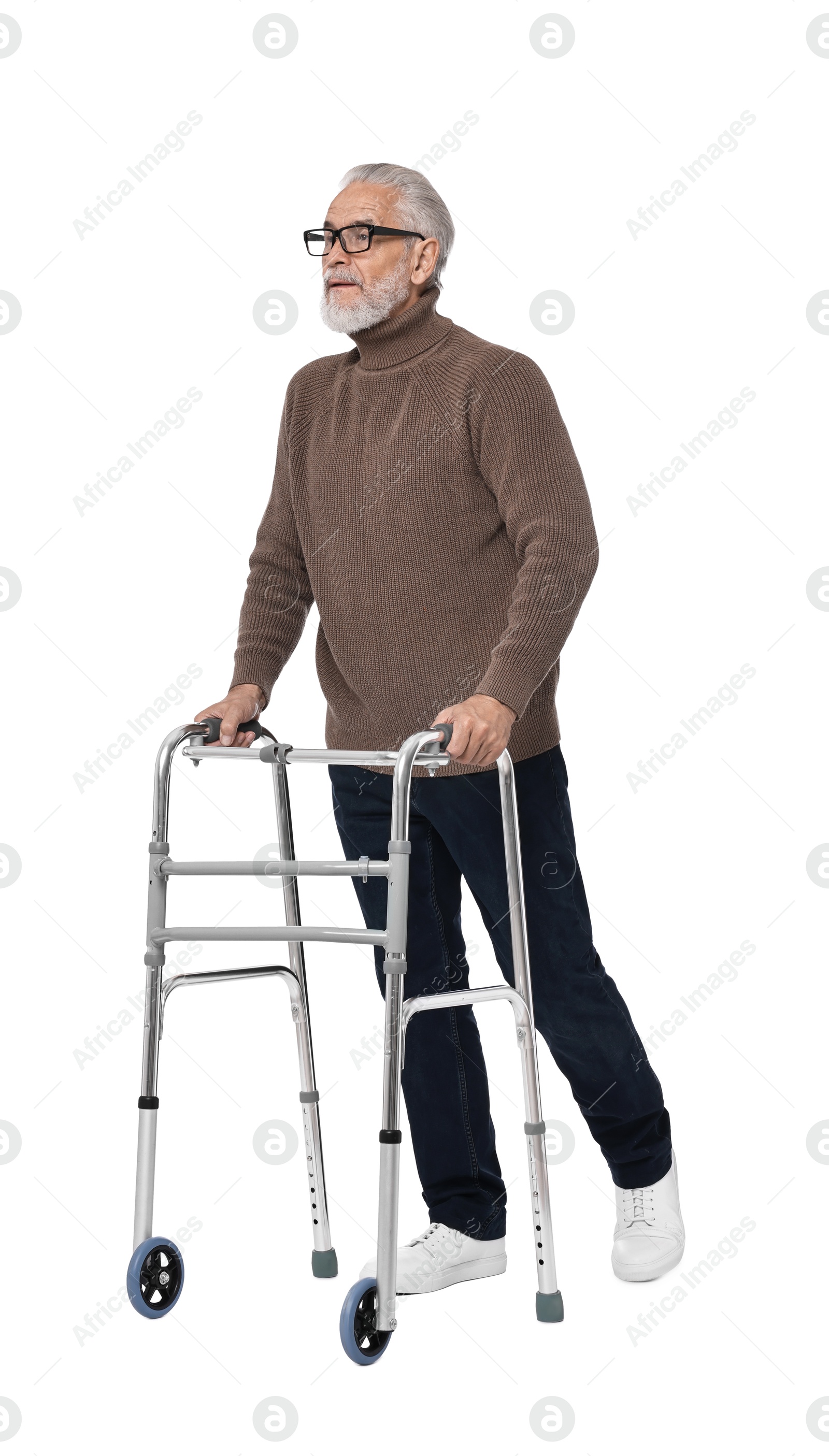 Photo of Senior man using walking frame on white background