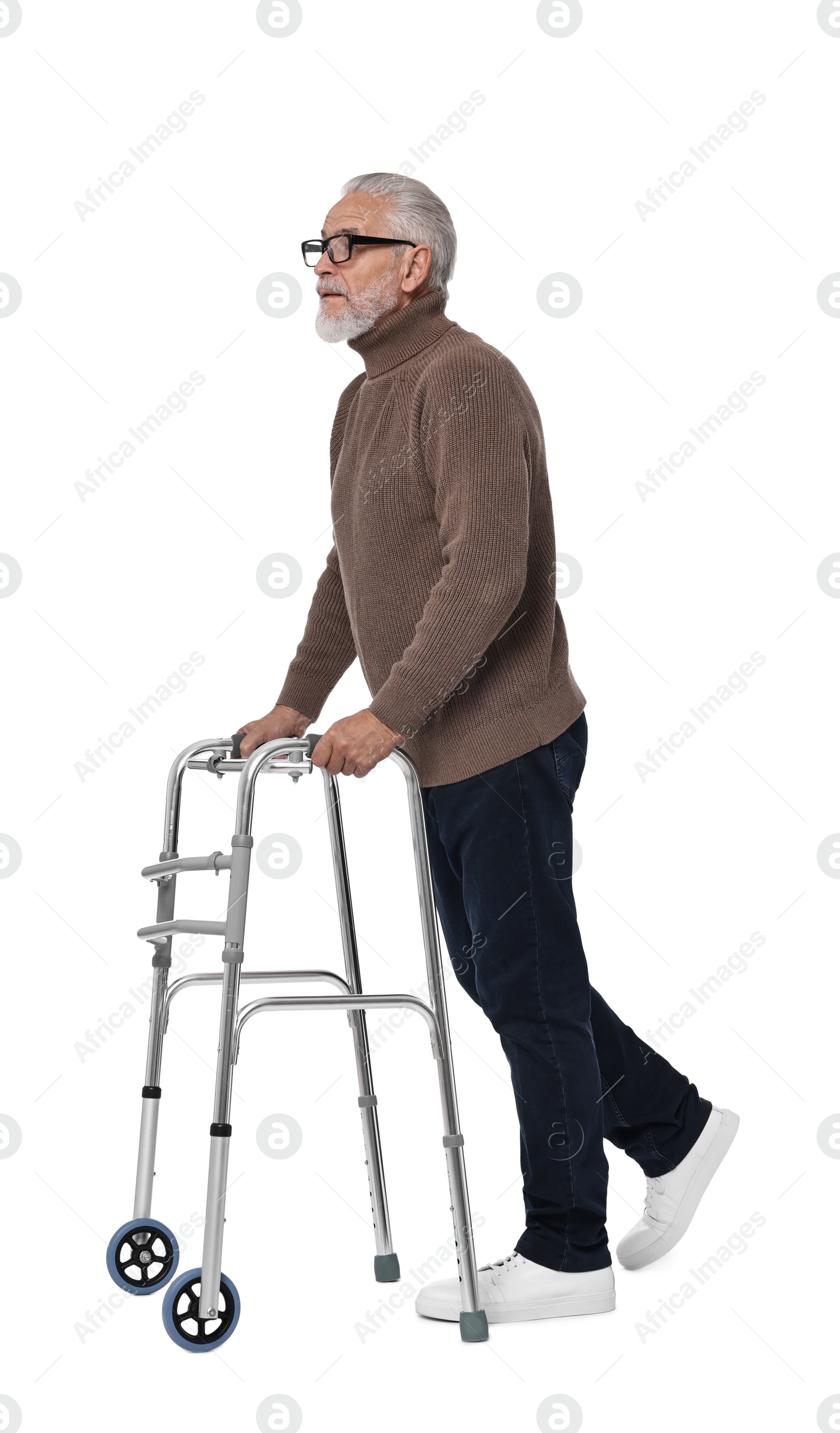 Photo of Senior man using walking frame on white background