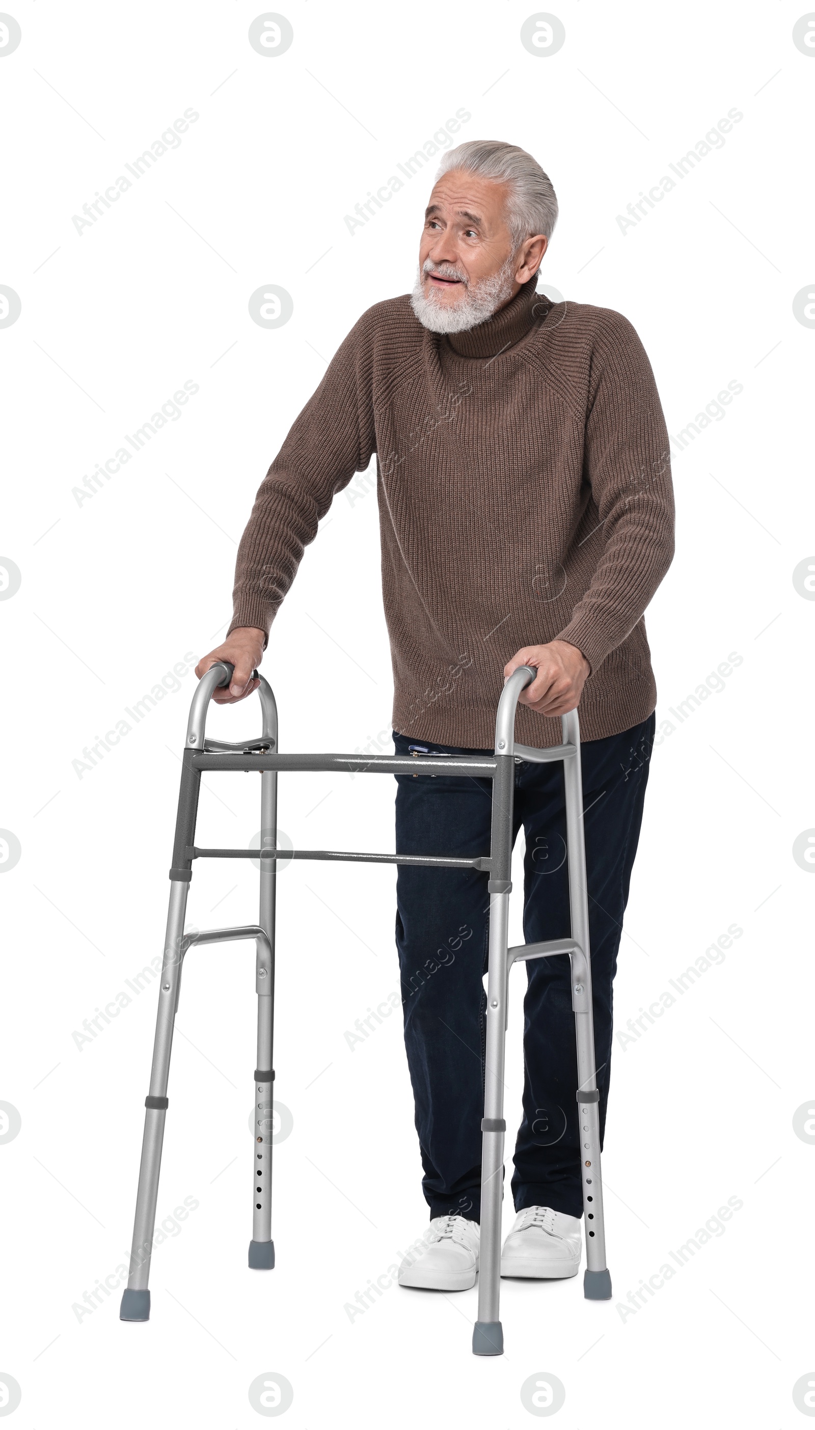 Photo of Senior man using walking frame on white background