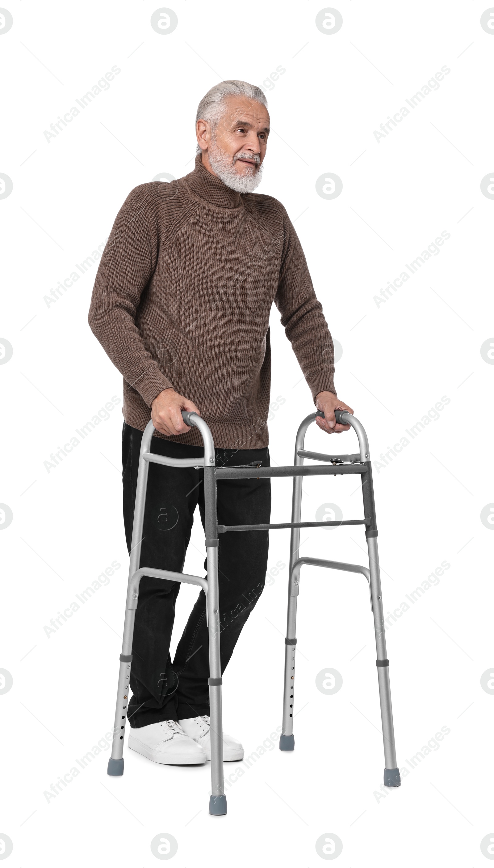 Photo of Senior man using walking frame on white background