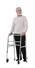 Senior man using walking frame on white background