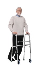 Photo of Senior man using walking frame on white background