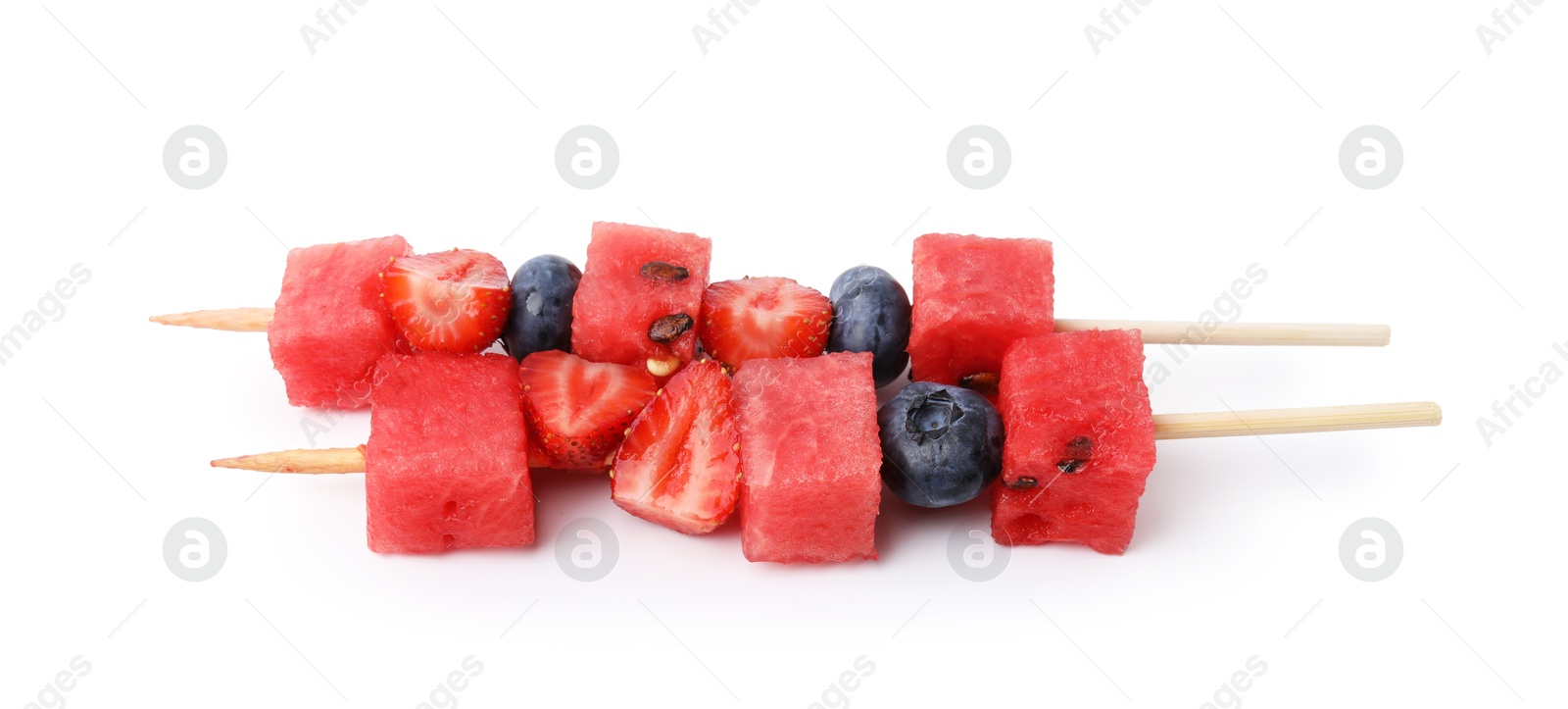 Photo of Skewers with tasty watermelon, blueberries and strawberries isolated on white