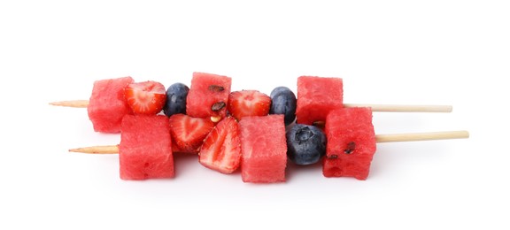 Photo of Skewers with tasty watermelon, blueberries and strawberries isolated on white