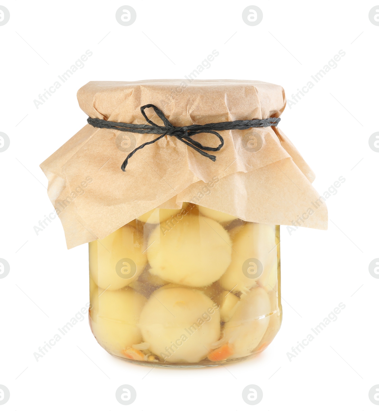 Photo of Tasty pickled mushrooms in jar isolated on white