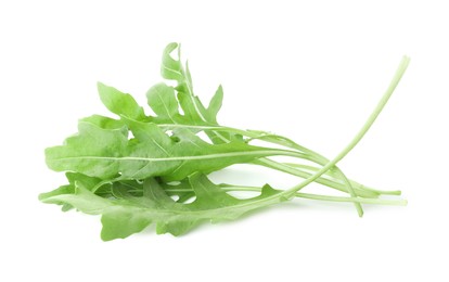 Photo of Many fresh arugula leaves on white background