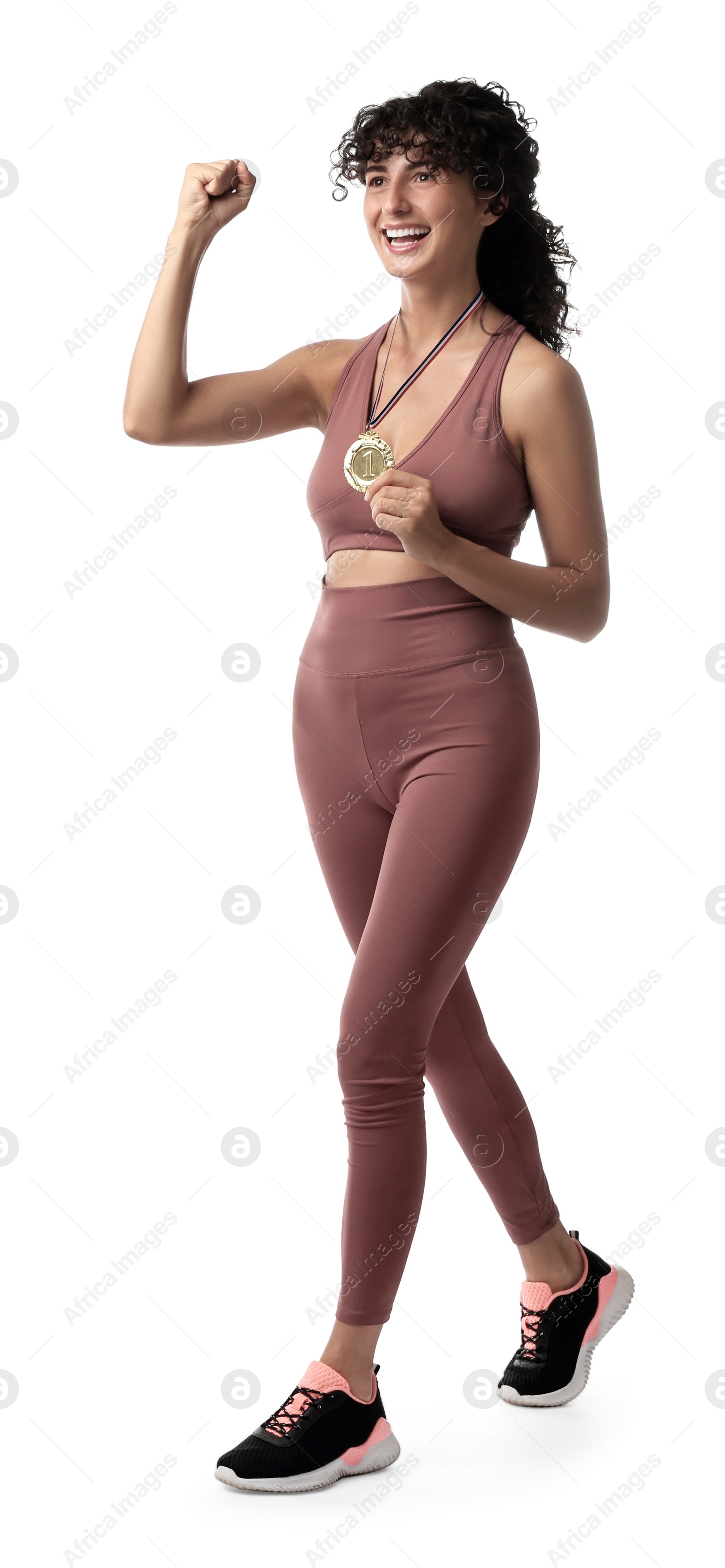 Photo of Happy winner with golden medal on white background