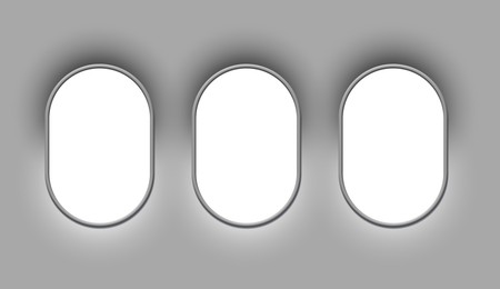 Image of Airplane windows, view from inside cabin with grey sidewall