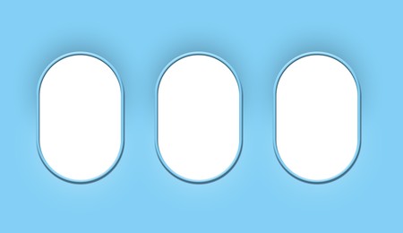 Image of Airplane windows, view from inside cabin with light blue sidewall