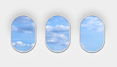 Beautiful sky with clouds, view through airplane windows in white sidewall of cabin