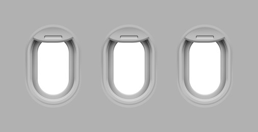 Image of Airplane windows, view from inside cabin with grey sidewall