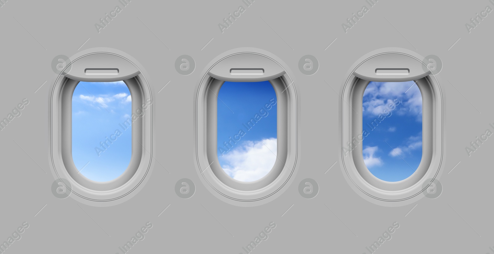 Image of Beautiful sky with clouds, view through airplane windows in grey sidewall of cabin