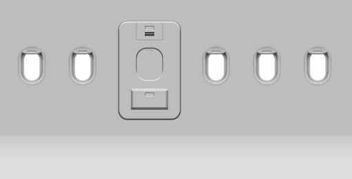 Image of Airplane windows and door, view from inside cabin with grey sidewall