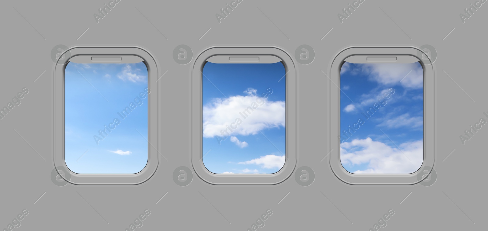 Image of Beautiful sky with clouds, view through airplane windows in grey sidewall of cabin