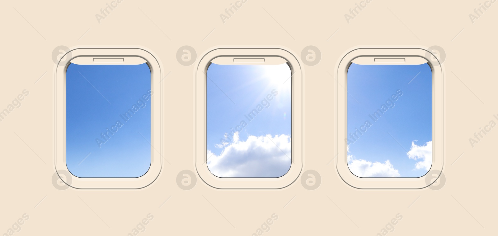 Image of Beautiful sky with clouds and sun, view through airplane windows in beige sidewall of cabin