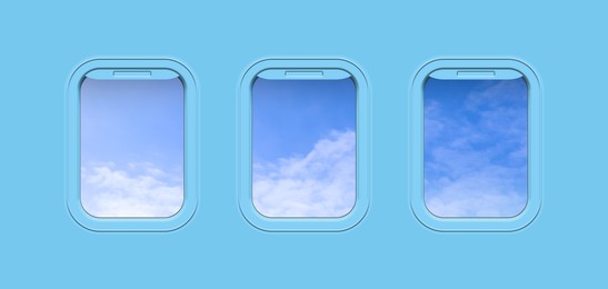 Beautiful sky with clouds, view through airplane windows in light blue sidewall of cabin