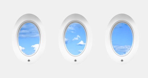 Image of Beautiful sky with clouds, view through airplane windows in white sidewall of cabin