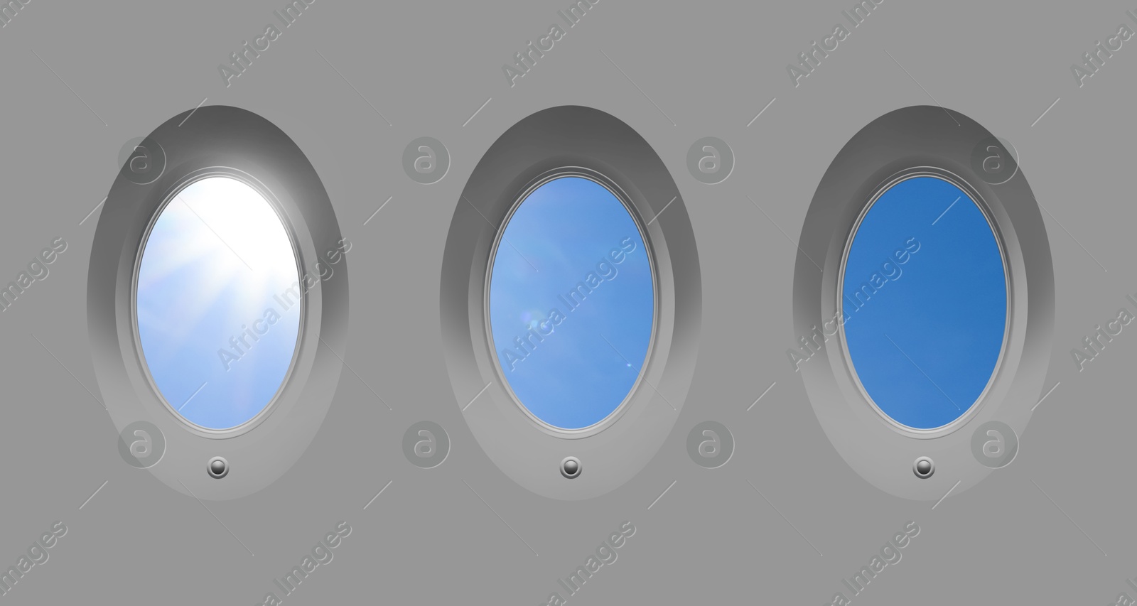 Image of Beautiful sky and sun, view through airplane windows in grey sidewall of cabin