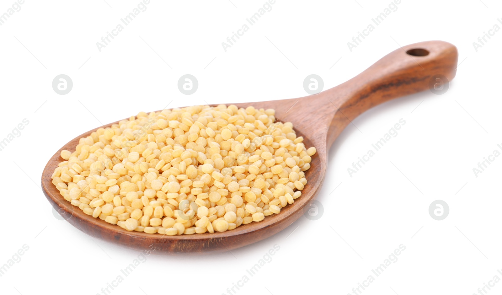 Photo of Raw couscous in wooden spoon isolated on white