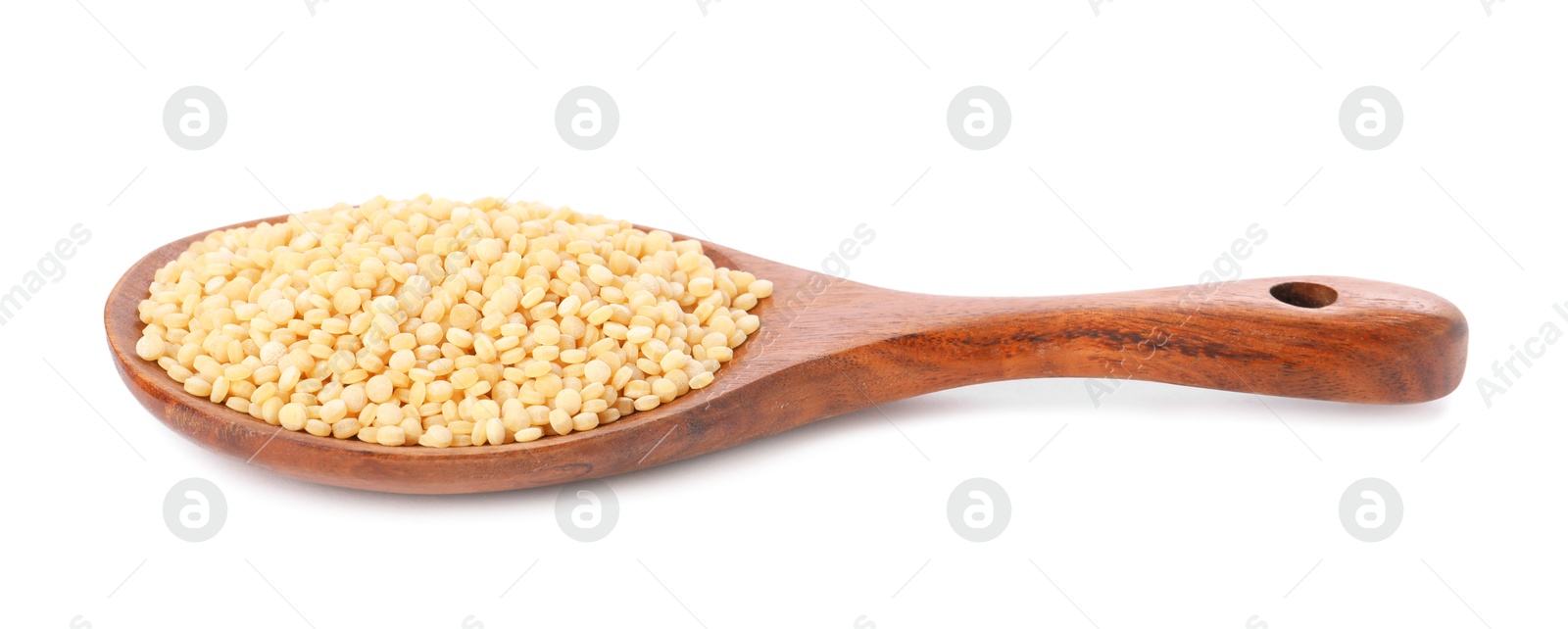 Photo of Raw couscous in wooden spoon isolated on white