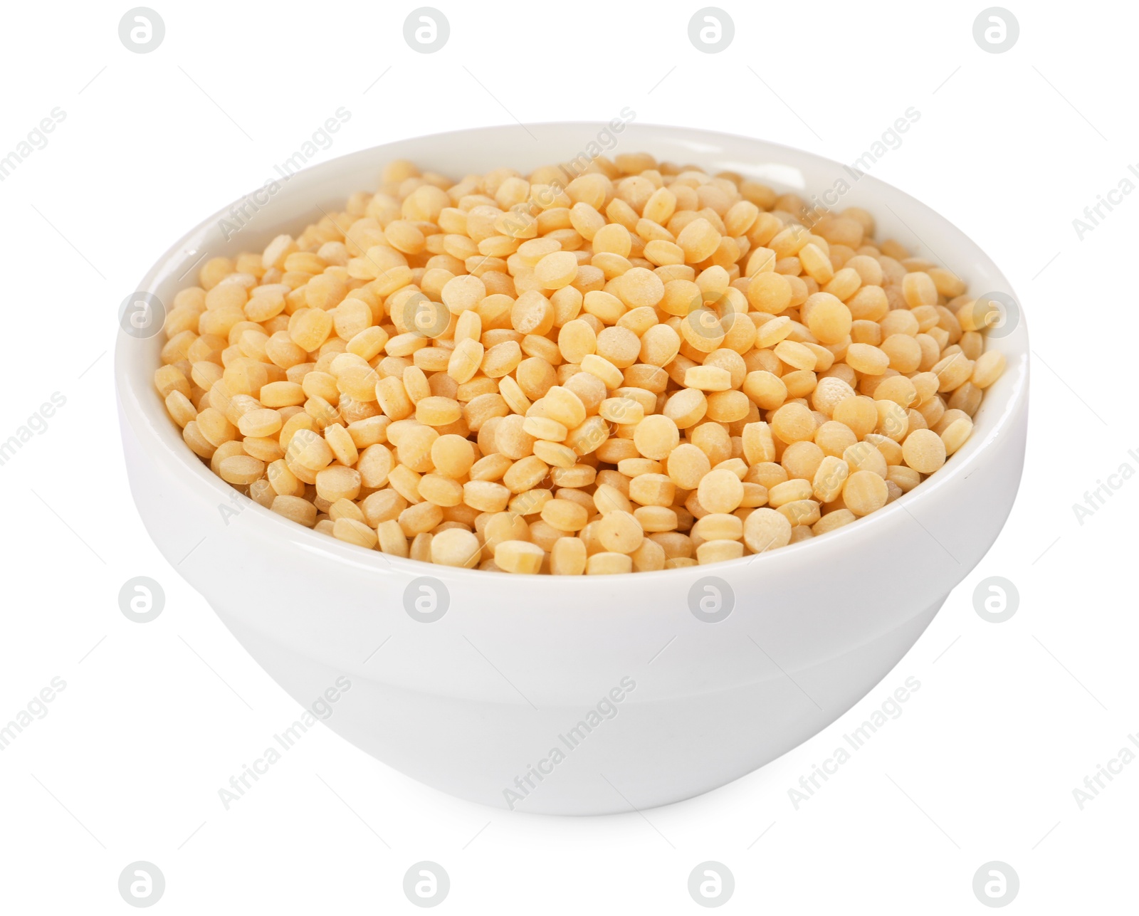 Photo of Raw couscous in bowl isolated on white