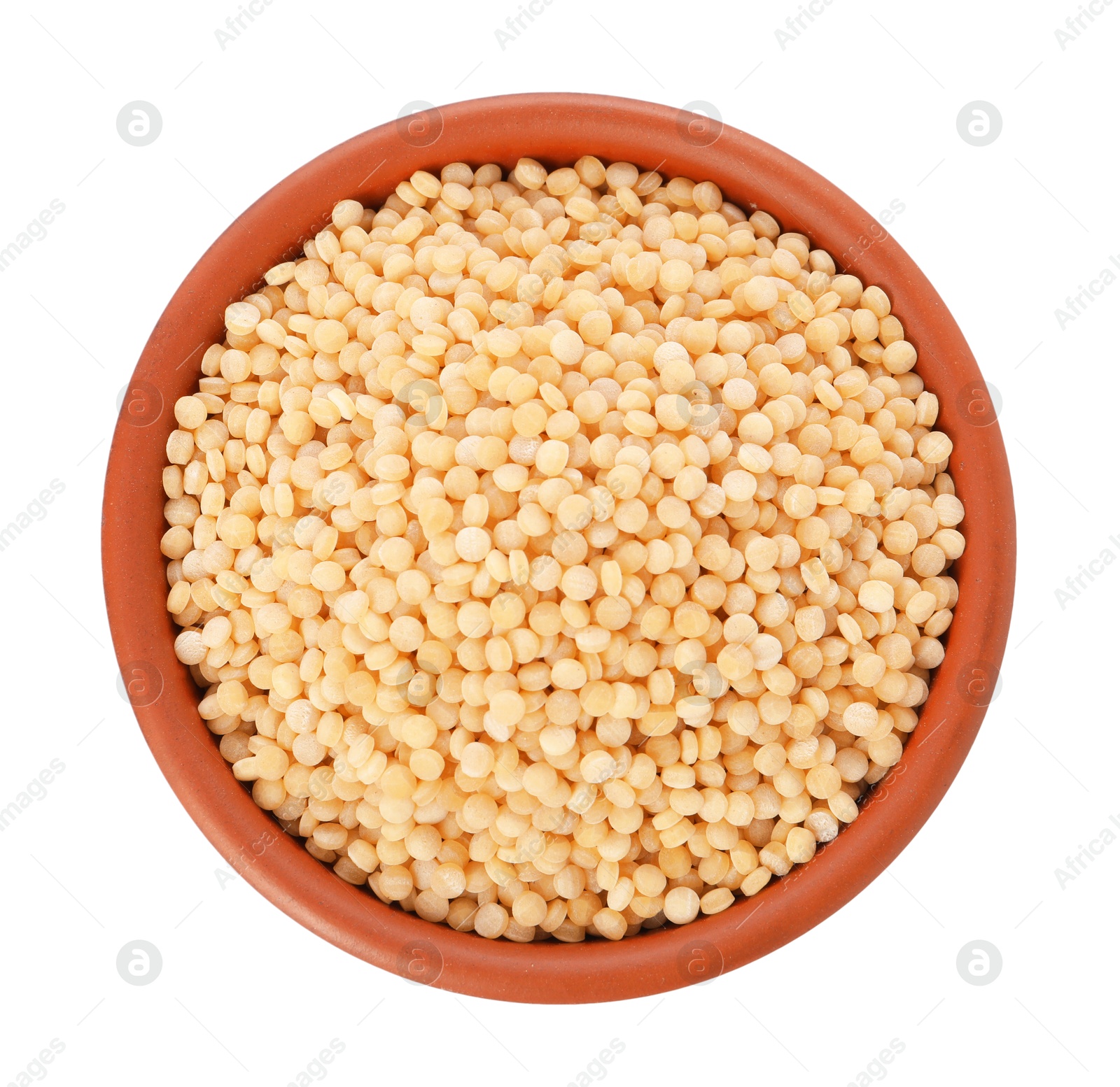 Photo of Raw couscous in bowl isolated on white, top view