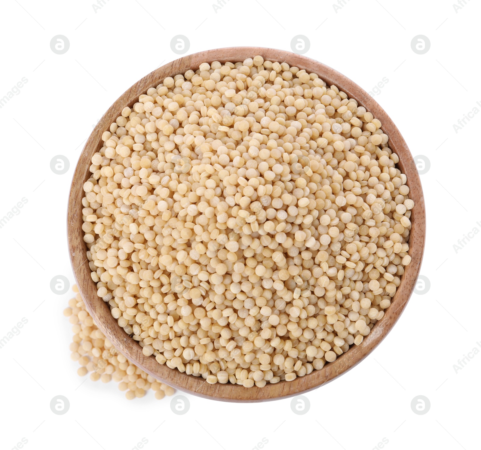 Photo of Raw couscous in wooden bowl isolated on white, top view