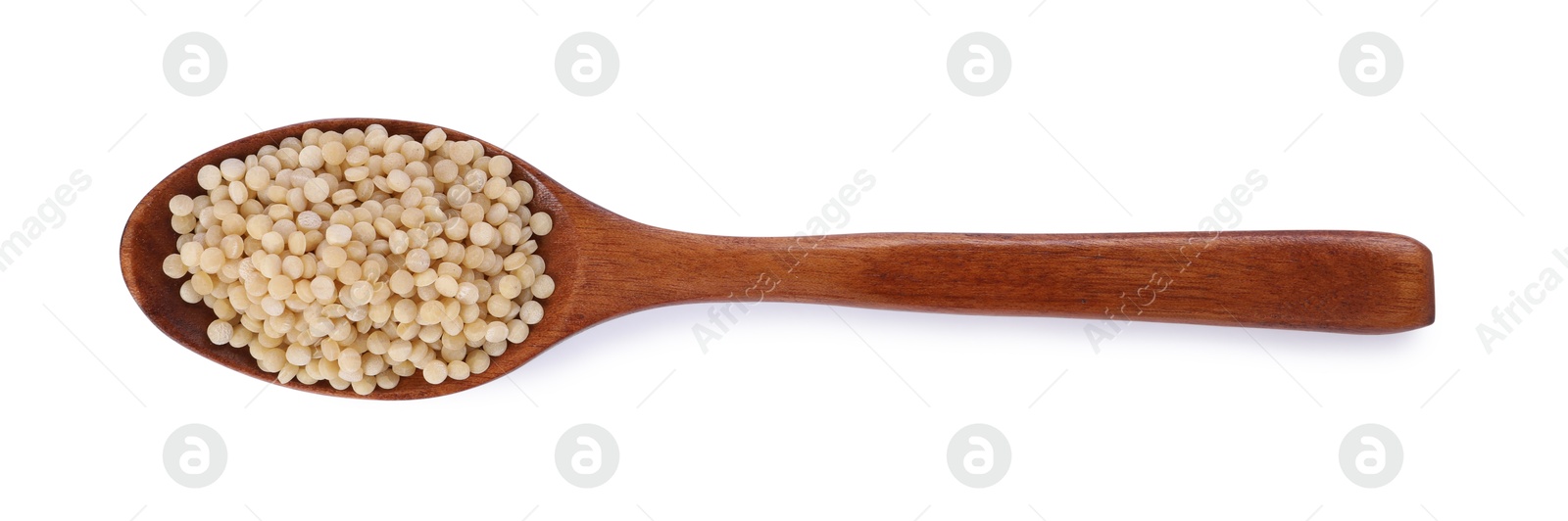 Photo of Raw couscous in wooden spoon isolated on white, top view