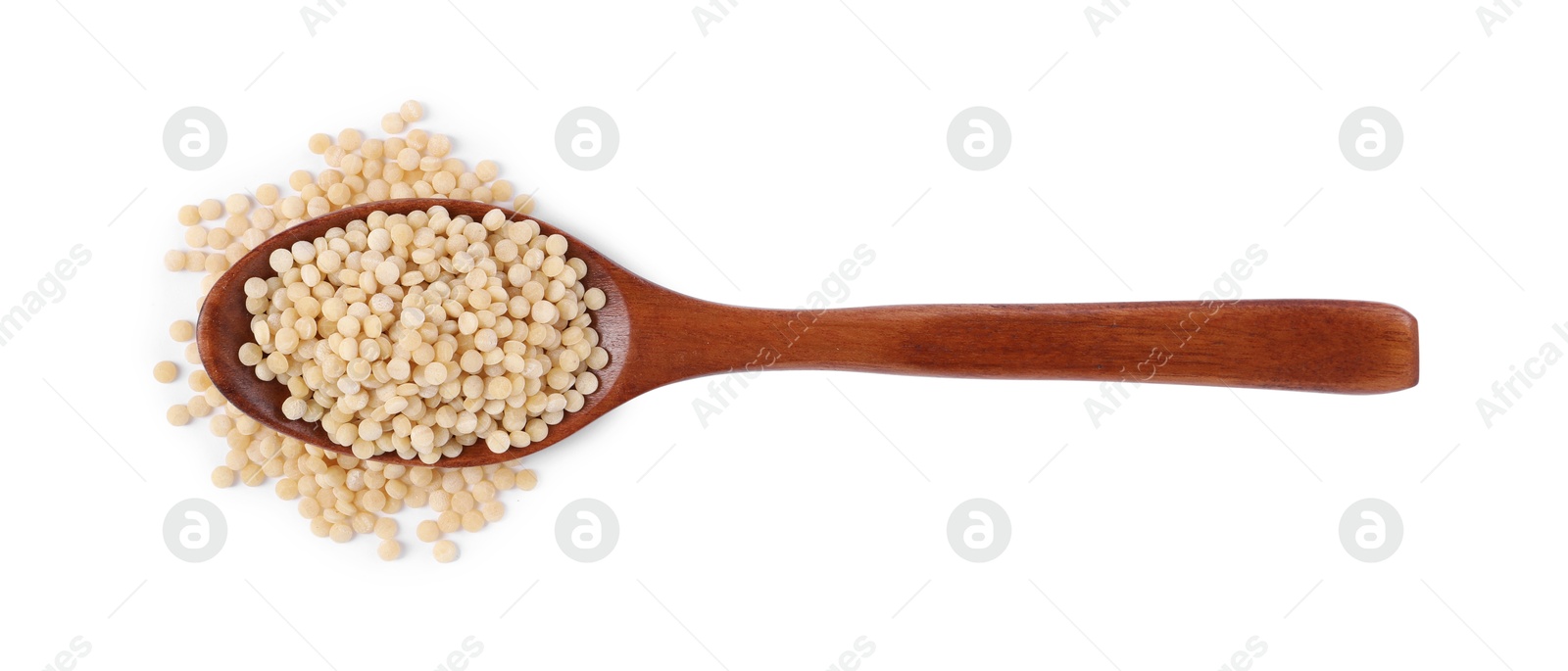 Photo of Raw couscous in wooden spoon isolated on white, top view