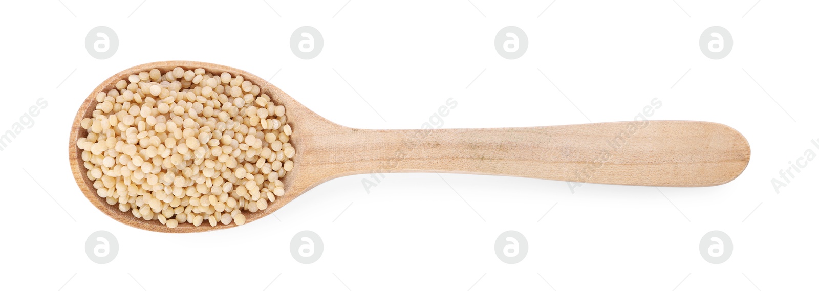 Photo of Raw couscous in wooden spoon isolated on white, top view