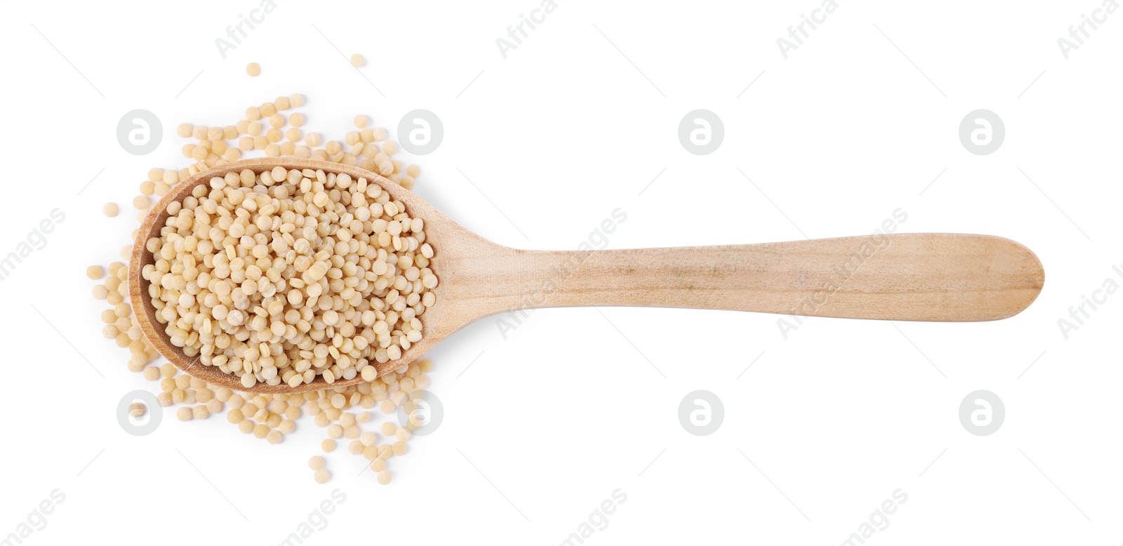 Photo of Raw couscous in wooden spoon isolated on white, top view