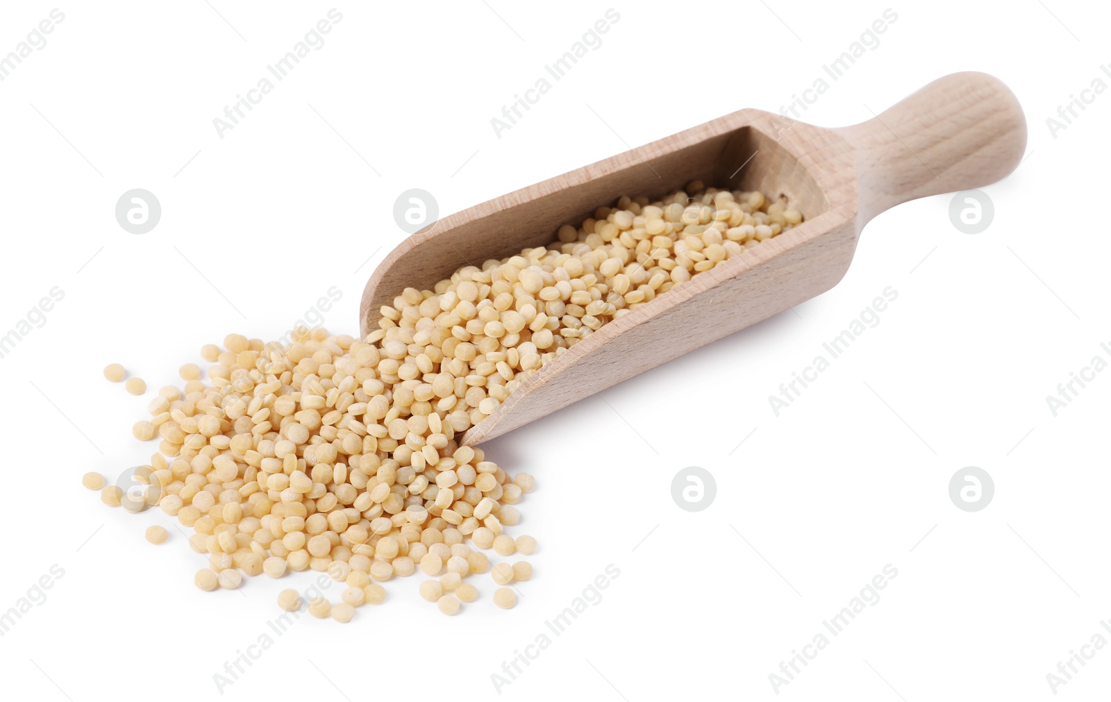 Photo of Raw couscous in wooden scoop isolated on white