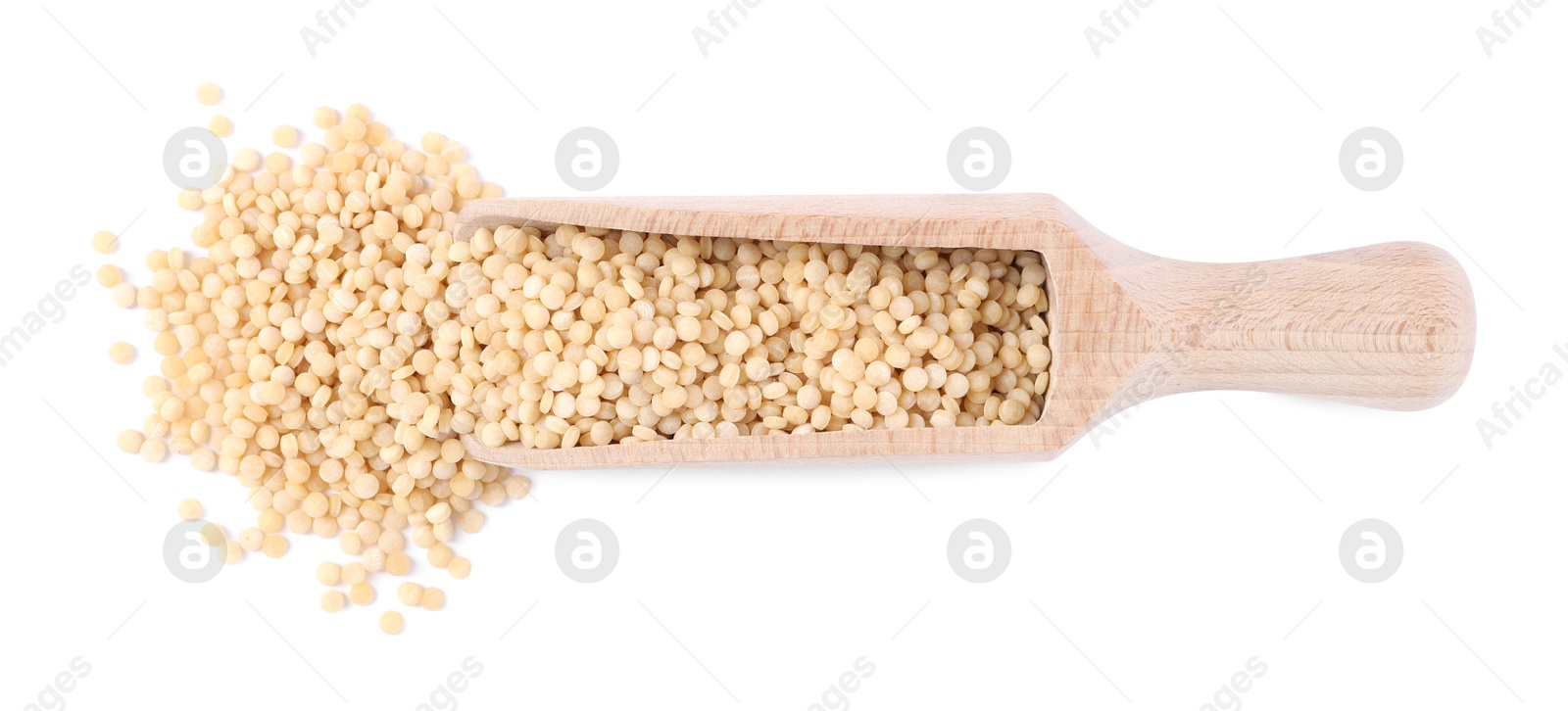 Photo of Raw couscous in wooden scoop isolated on white, top view