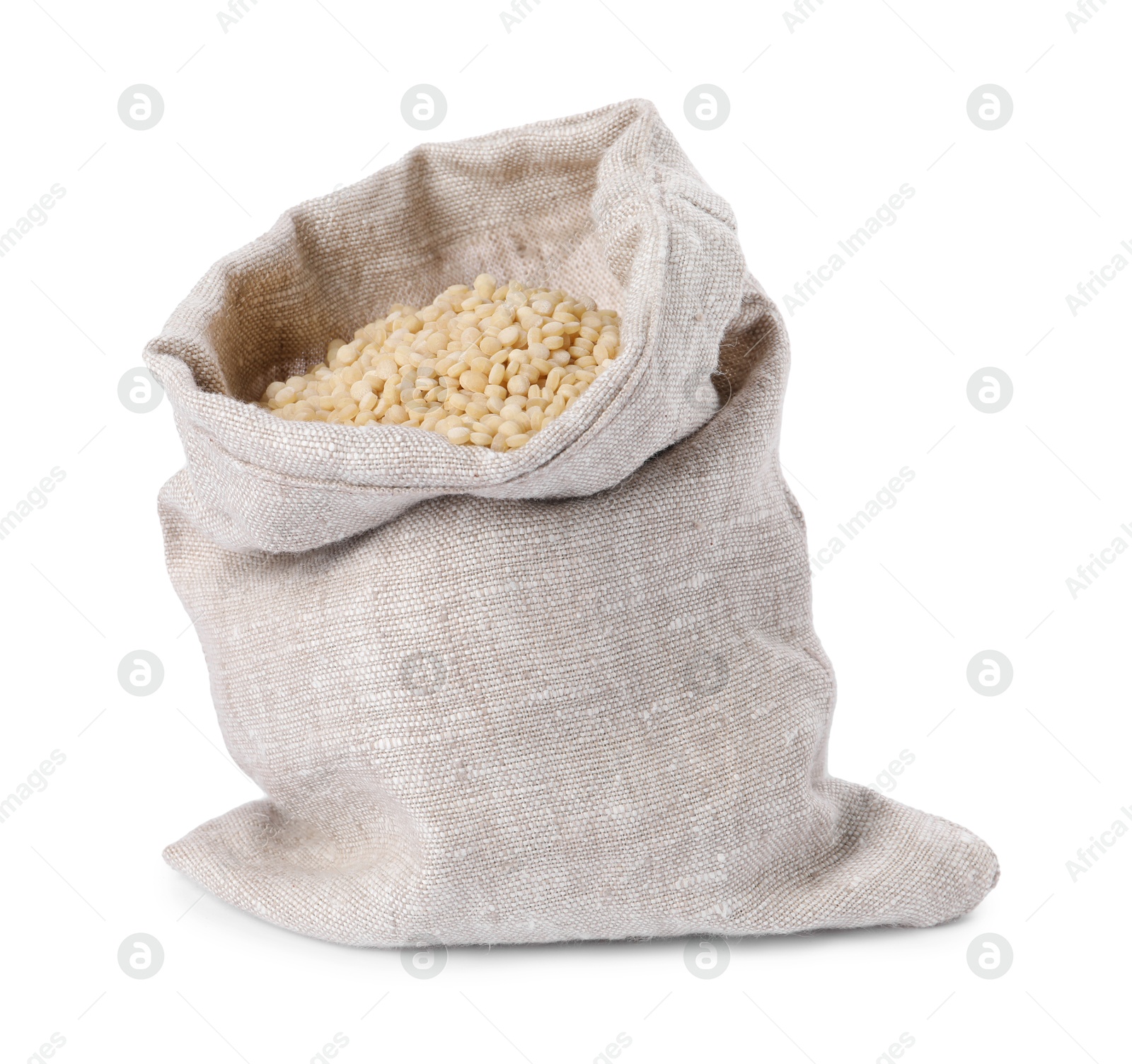 Photo of Raw couscous in burlap sack isolated on white