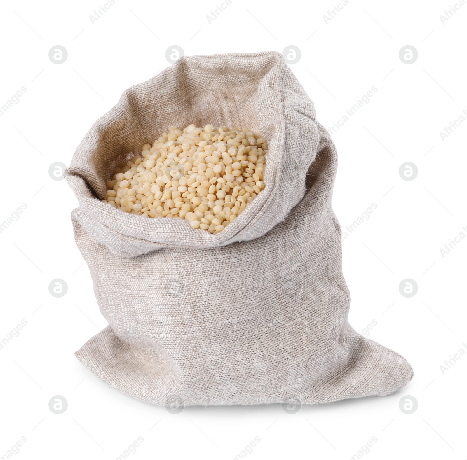 Photo of Raw couscous in burlap sack isolated on white