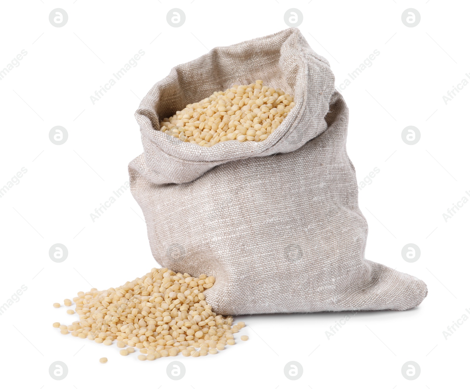 Photo of Raw couscous in burlap sack isolated on white