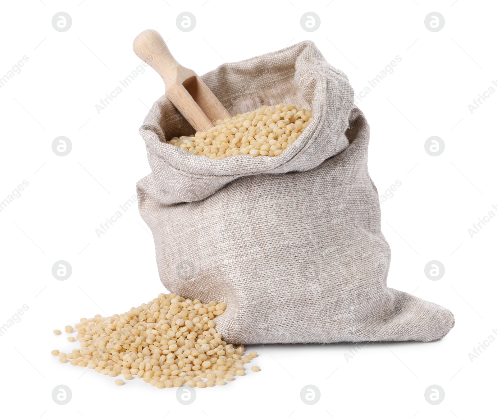 Photo of Raw couscous in burlap sack and scoop isolated on white