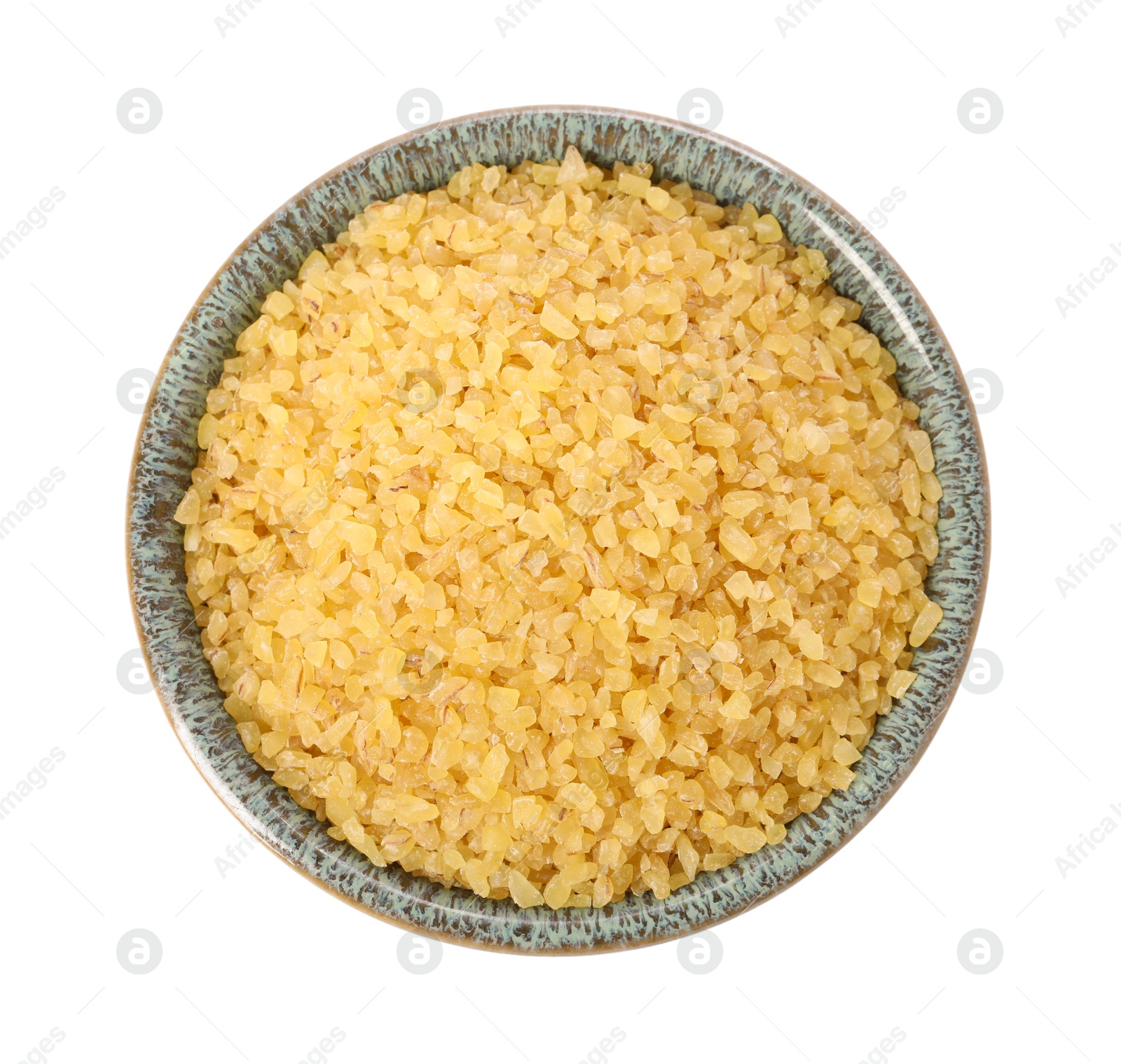 Photo of Raw bulgur in bowl isolated on white, top view